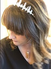 Load image into Gallery viewer, Woman with long thick dark hair wearing a clrear quartz home-made tiara

